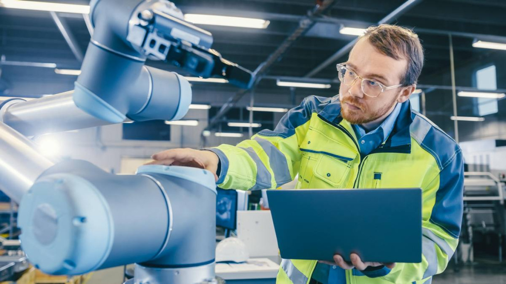 man-green-safety-jacket-stands-warehouse-looks-robot.jpg
